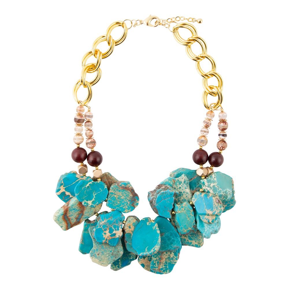 Turquoise stone necklace with gold chain and beaded accents on a white background